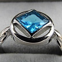 woman medium service ring blue topaz